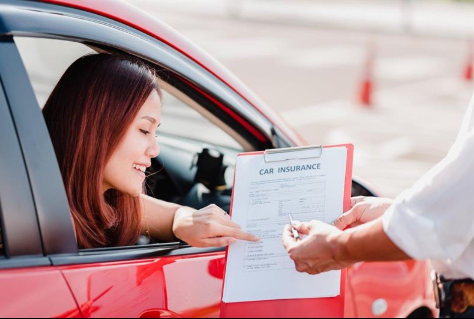 Car Insurance Auto insurance refund plan brings financial relief to drivers reviewing policy documents